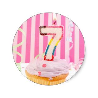 Birthday cupcake with the number 7 candle lit stickers