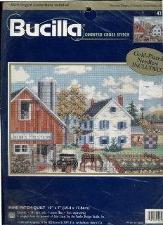 Bucilla Counted Cross Stitch Kit Nine Patch Quilt Adapted From the Artwork of Julia Lucas Features a Farm With a Horse and Carriage in the Foreground Next to a Garden and a Red Barn 10 by 7 Inches