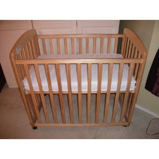 DaVinci Alpha Mini Rocking Crib   Natural  Baby Crib With Wheels  Baby