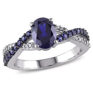 CT. T.W. Simulated Blue Sapphire and 1/10 CT. T.W. Diamond Ring