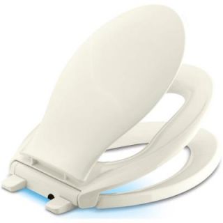 KOHLER Transitions Nightlight Elongated Closed Front Toilet Seat in Biscuit K 2599 96