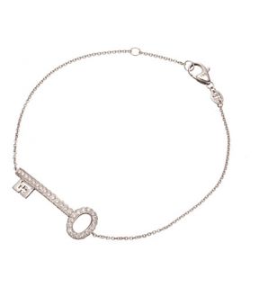 THEO FENNELL   18ct white gold baby key spangle bracelet