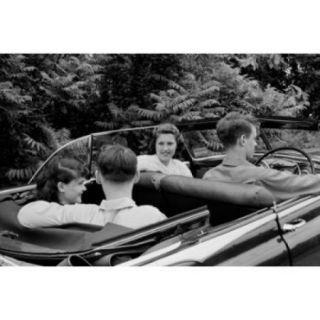Two young couples during car drive Poster Print (18 x 24)